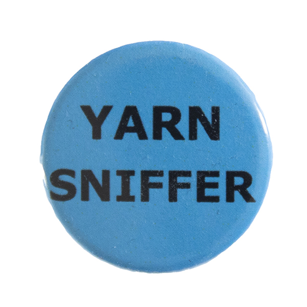 blue pin badge with text "YARN SNIFFER"