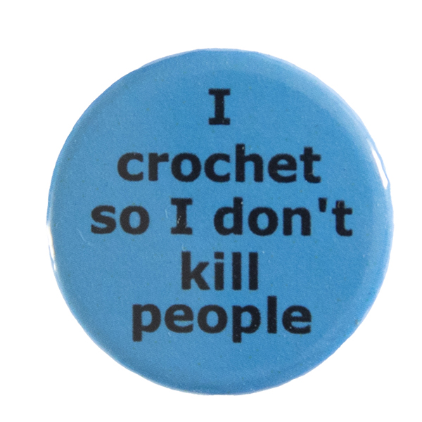 blue pin badge with text "I crochet so I don't kill people"
