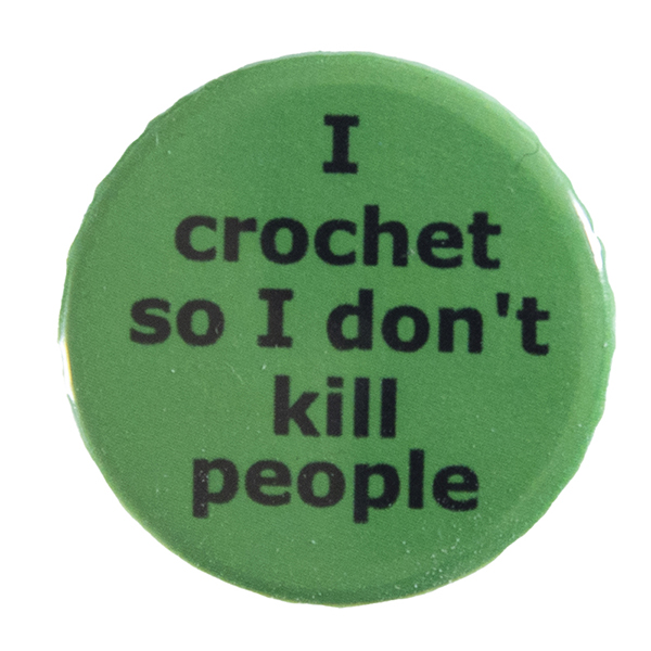 green pin badge with text "I crochet so I don't kill people"