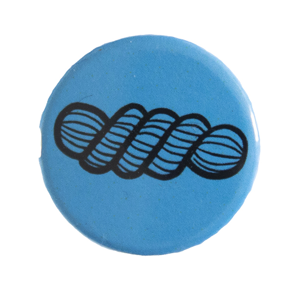 blue pin badge with line drawing of a skein of yarn