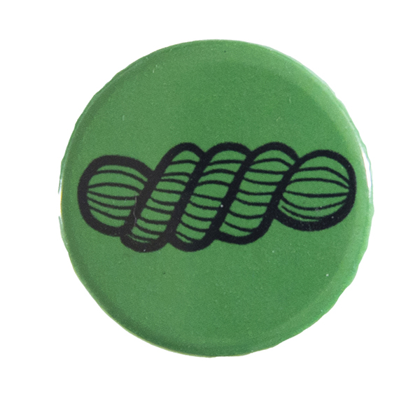 green pin badge with line drawing of a skein of yarn
