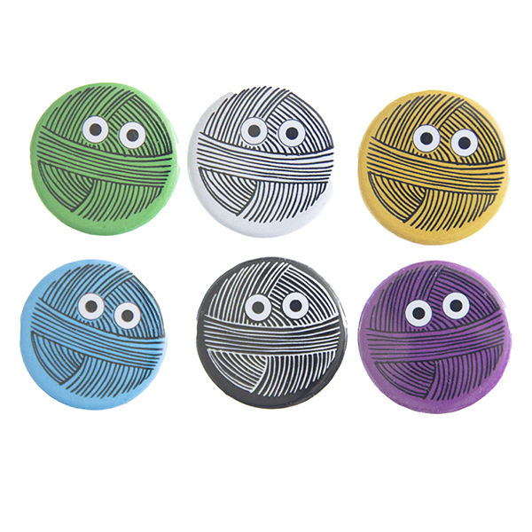 pin badges with drawing of yarn balls with eyes Badges are green, light grey, yellow. blue, black and pink