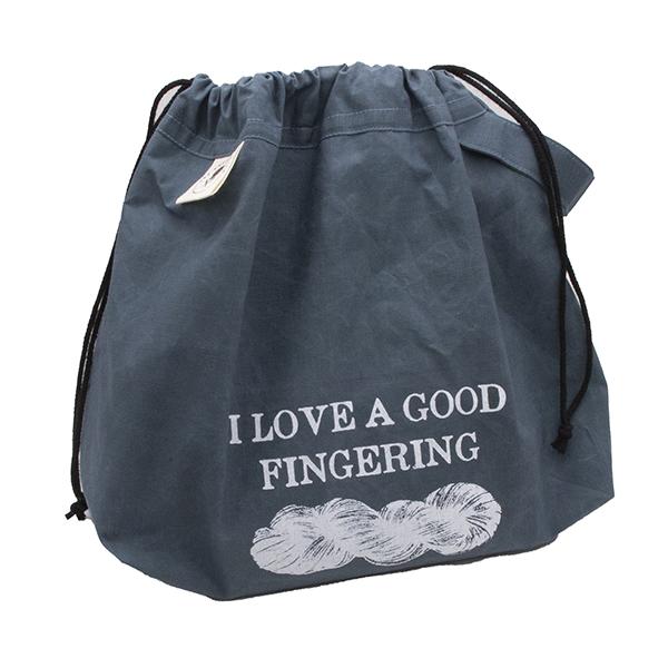 slate blue project bag made from waxed cotton, screen printed with "I LOVE A GOOD FINGERING" and a skein of yarn