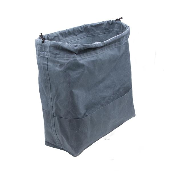 large drawstring project bag in slate blue fabric, wrist strap, drawstring closure, inside view showing pockets