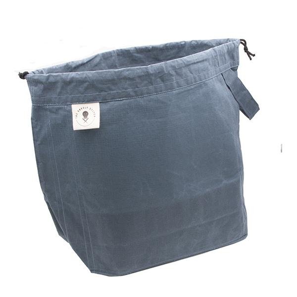 large drawstring project bag in slate blue fabric, wrist strap, drawstring closure, the unruly stitch label