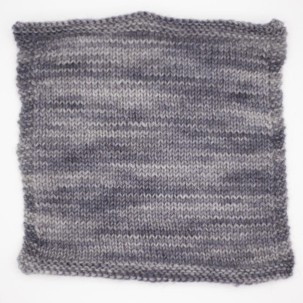 stocking stitch square on 2mm needles sample swatch of baby elephant mid grey tonal Be Reyt yarn