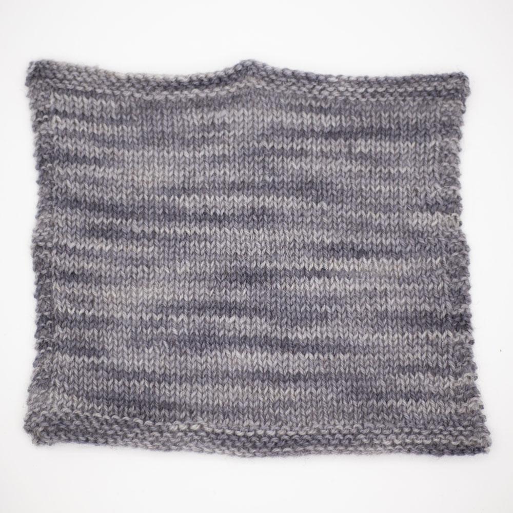 stocking stitch square on 3.25mm needles sample swatch of baby elephant mid grey tonal Be Reyt yarn