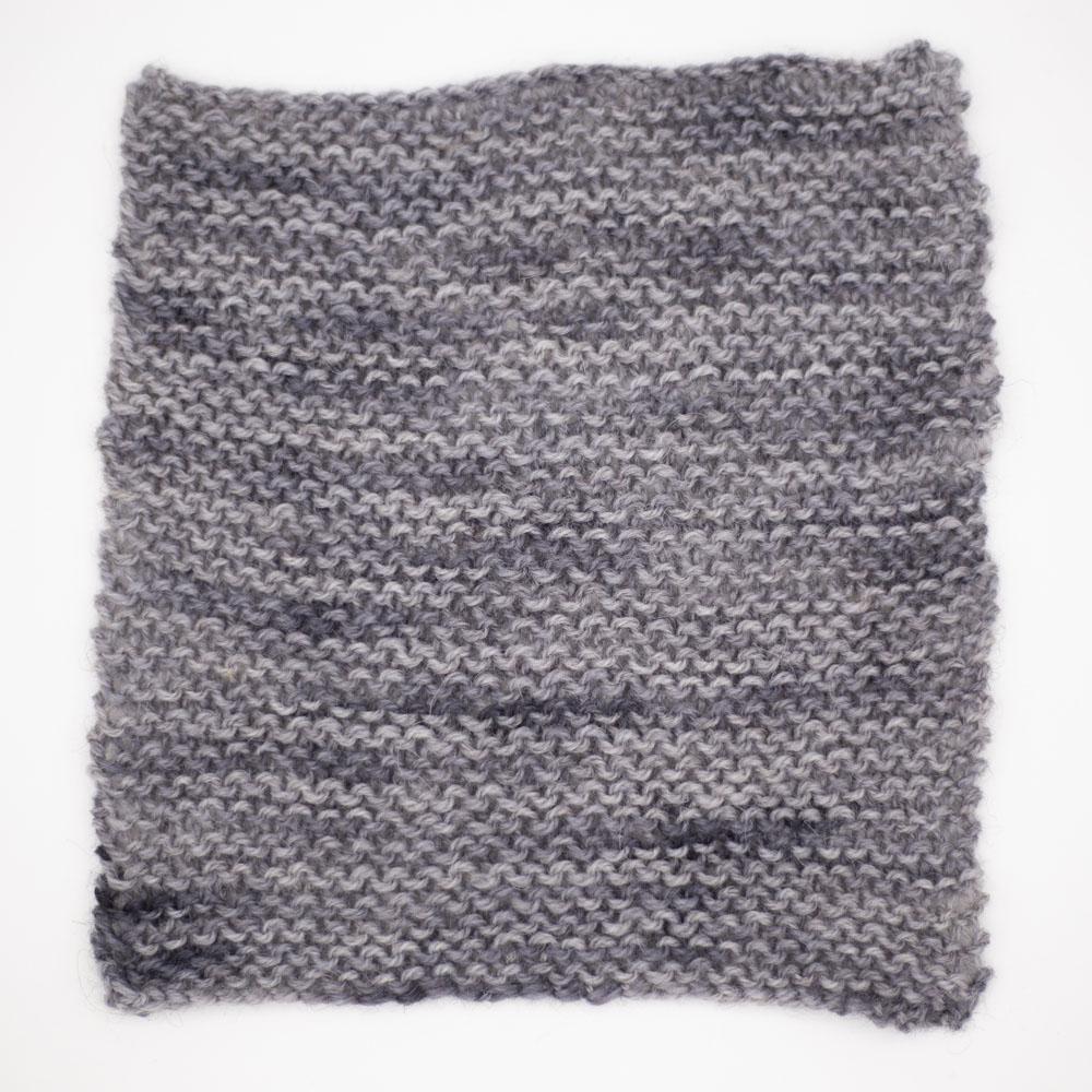 garter stitch square on 4mm needles sample swatch of baby elephant mid grey tonal Be Reyt yarn