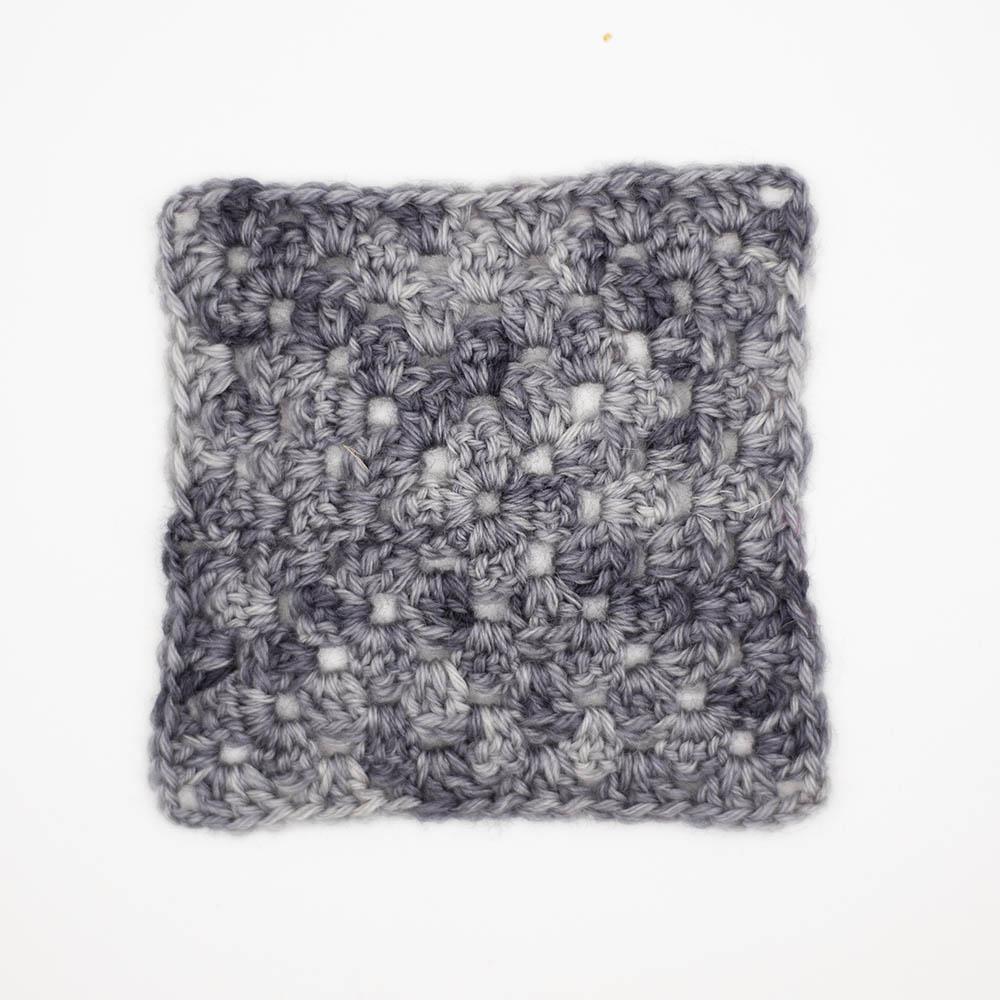granny square crochet sample swatch 3.25mm hook of baby elephant mid grey tonal BFL yarn
