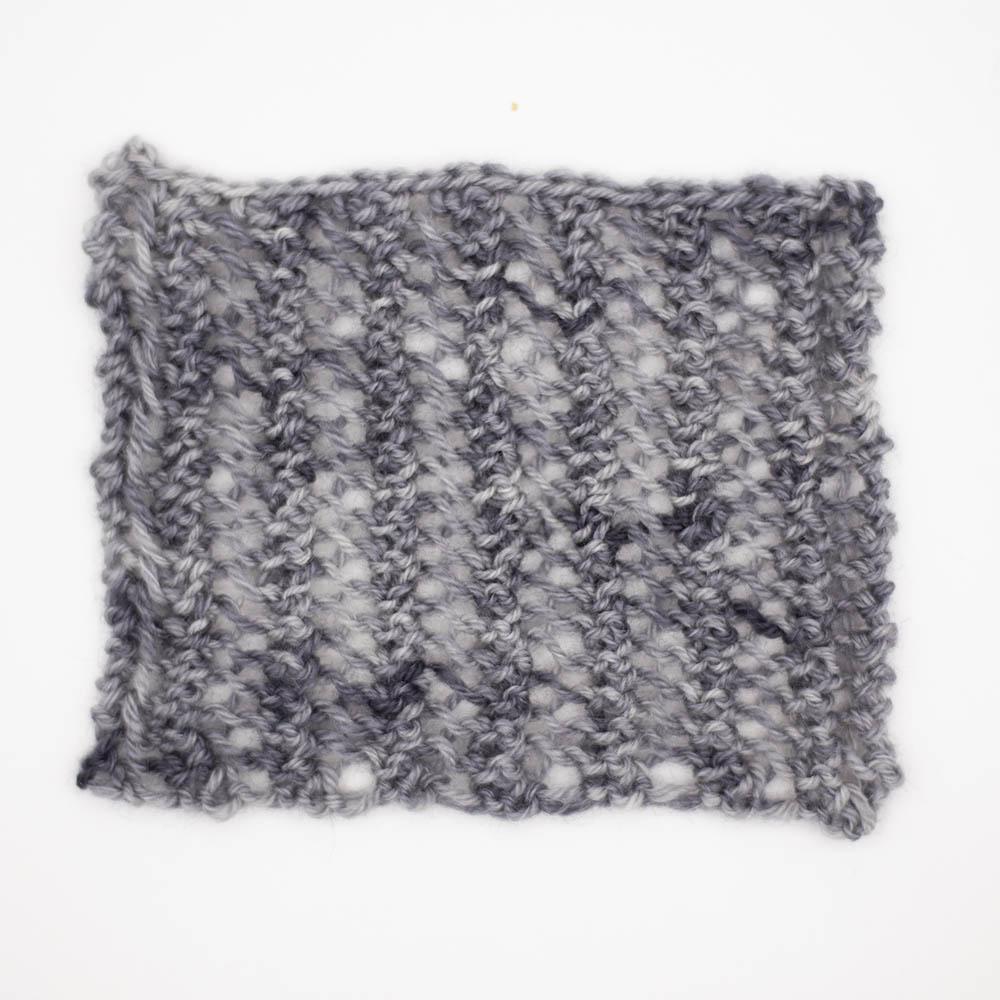 mesh knitting 4mm needles sample swatch of baby elephant mid grey tonal BFL yarn