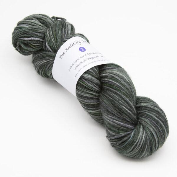 skein of blackened forest Bluefaced Leicester wool, The Knitting Goddess ball band