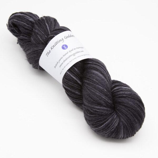 skein of black Bluefaced Leicester wool, The Knitting Goddess ball band