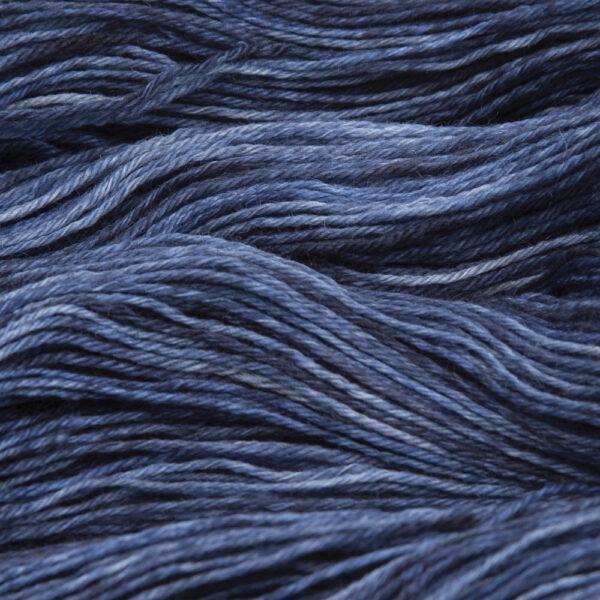 close up of hand dyed bluefaced leicester wool in blackened blue, a blue overdyed with black
