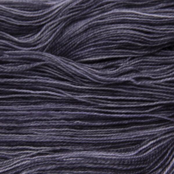 charcoal grey (mid to dark grey) hand dyed sock yarn, close up showing tonal variations