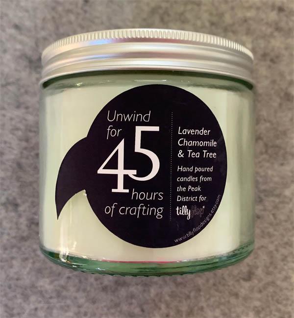 candle in screw top jar, labelled with 45 hours crafting time