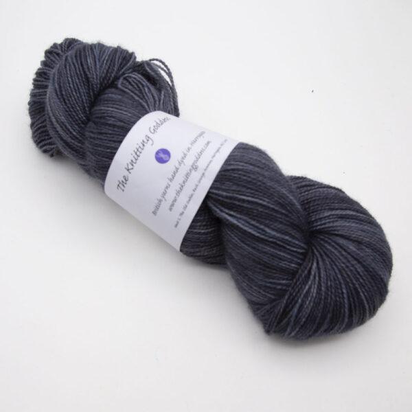 coal hand dyed sock yarn, wound up in a skein, The Knitting Goddess ball band