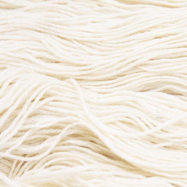 close up of hand dyed bluefaced leicester wool in cream