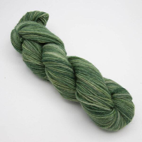 forest green hand dyed sock yarn, wound up in a skein