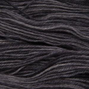 gunmetal (mid to dark grey) hand dyed sock yarn, close up showing tonal variations