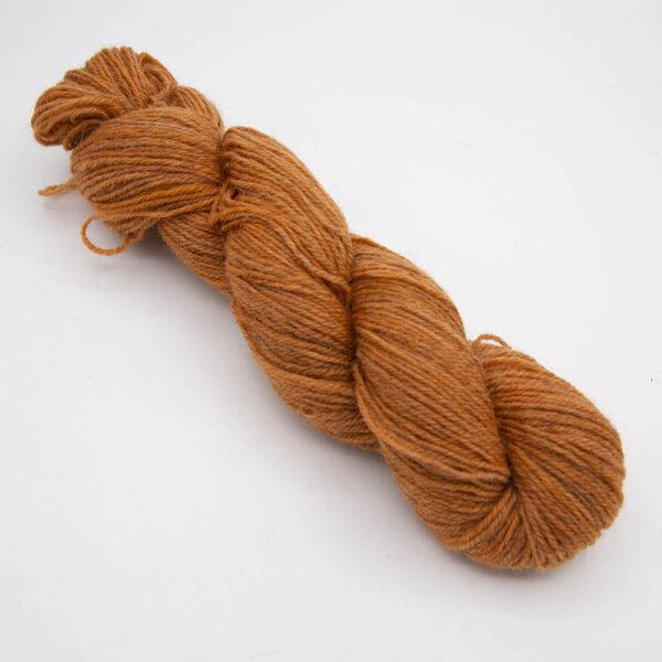 marigold hand dyed sock yarn, wound up in a skein