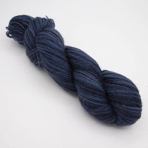 navy hand dyed sock yarn, wound up in a skein