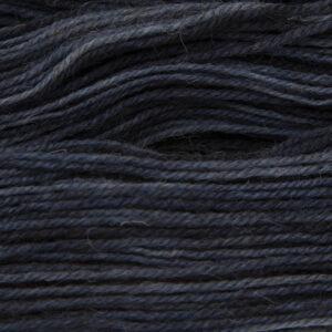 navy blue hand dyed sock yarn, close up showing tonal variations
