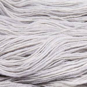 close up of hand dyed bluefaced leicester wool in pearl, a pale grey