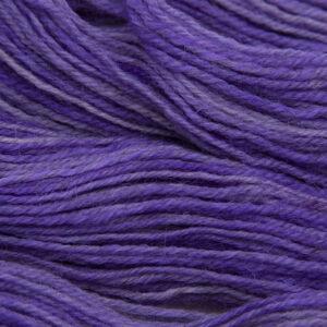 purple hand dyed sock yarn, close up showing tonal variations