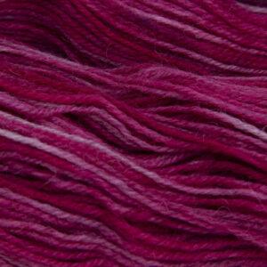 rose (pinkish red) hand dyed sock yarn, close up showing tonal variations