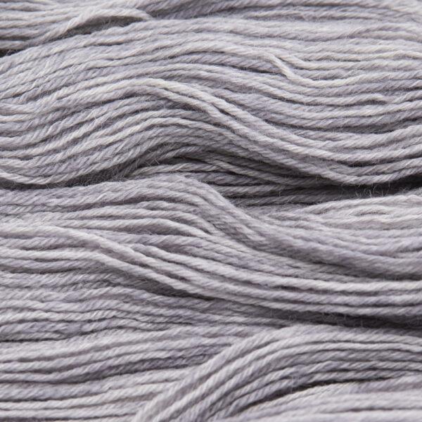 close up of hand dyed bluefaced leicester wool in silver grey