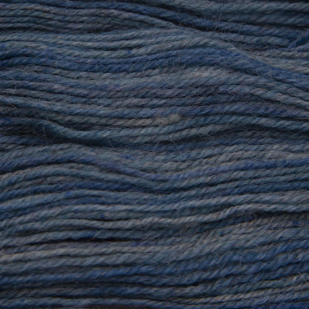 teal blue hand dyed sock yarn, close up showing tonal variations