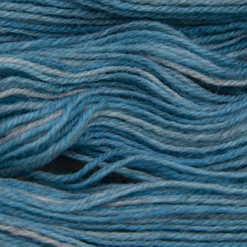 turquoise blue hand dyed sock yarn, close up showing tonal variations