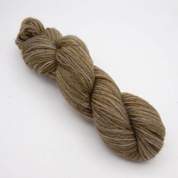 walnut hand dyed sock yarn, wound up in a skein