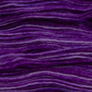 wisteria (pinkish purple) hand dyed sock yarn, close up showing tonal variations