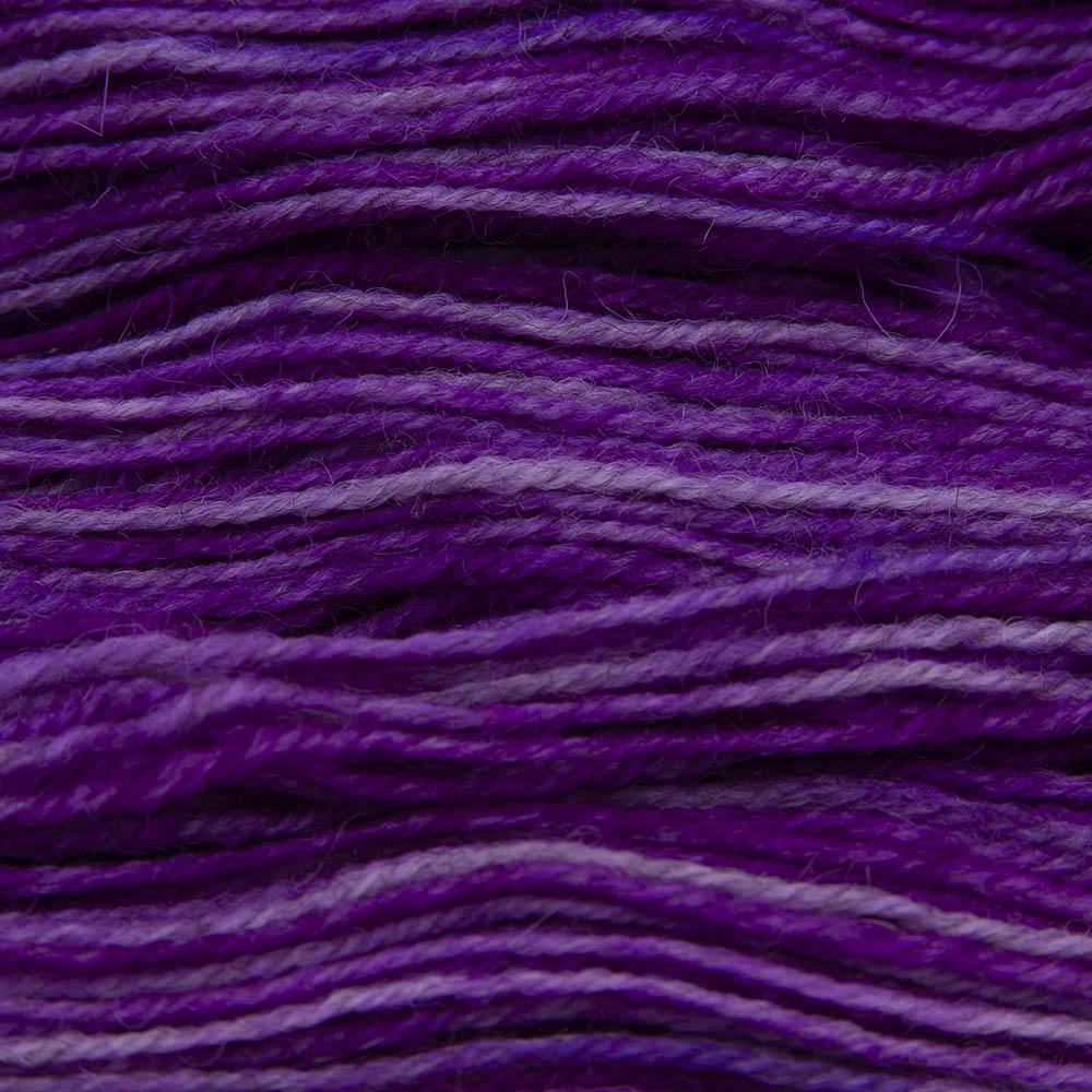 wisteria (pinkish purple) hand dyed sock yarn, close up showing tonal variations