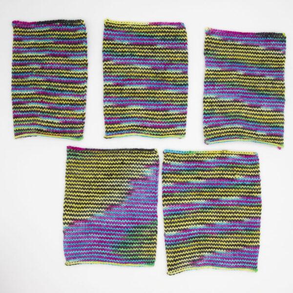 five swatches showing how black neon colourway knits on different numbers of stitches.