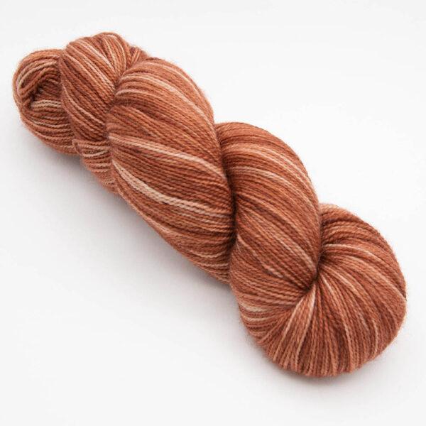 skein of copper Bluefaced Leicester and nylon yarn which has a high twist