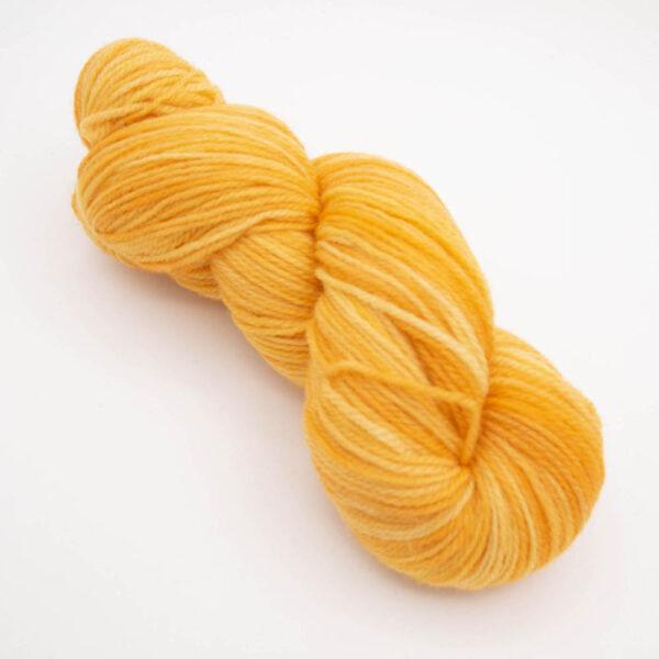 skein of marigold (golden orange) DK sock wool