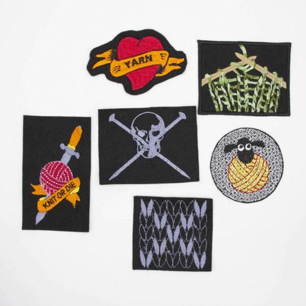 set of six embroidered patches; tattoo heart, knitting, dagger with knit or die, skull and knitting pins, sheep and knit stitches