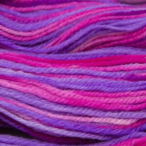 close up of sweet pea DK sock wool dyed in purple and pink