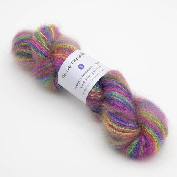 Fluffy moonbroch yarn dyed in rainbow colours. The skein has The Knitting Goddess ball band