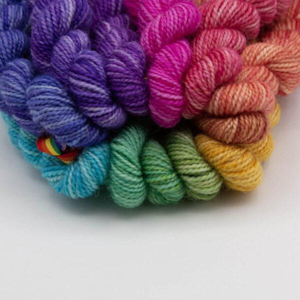 set of 12 mini skeins dyed in a hues colour wheel close up